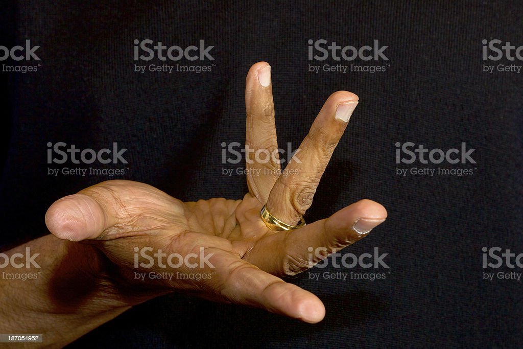 An older Indian male gestures with his hand to ask, "Where?"  The gesture often accompanies the question, "Where have you been?" in South India.  It is well known that Indians use their hands a lot to communicate or to emphasise what they say verbally.